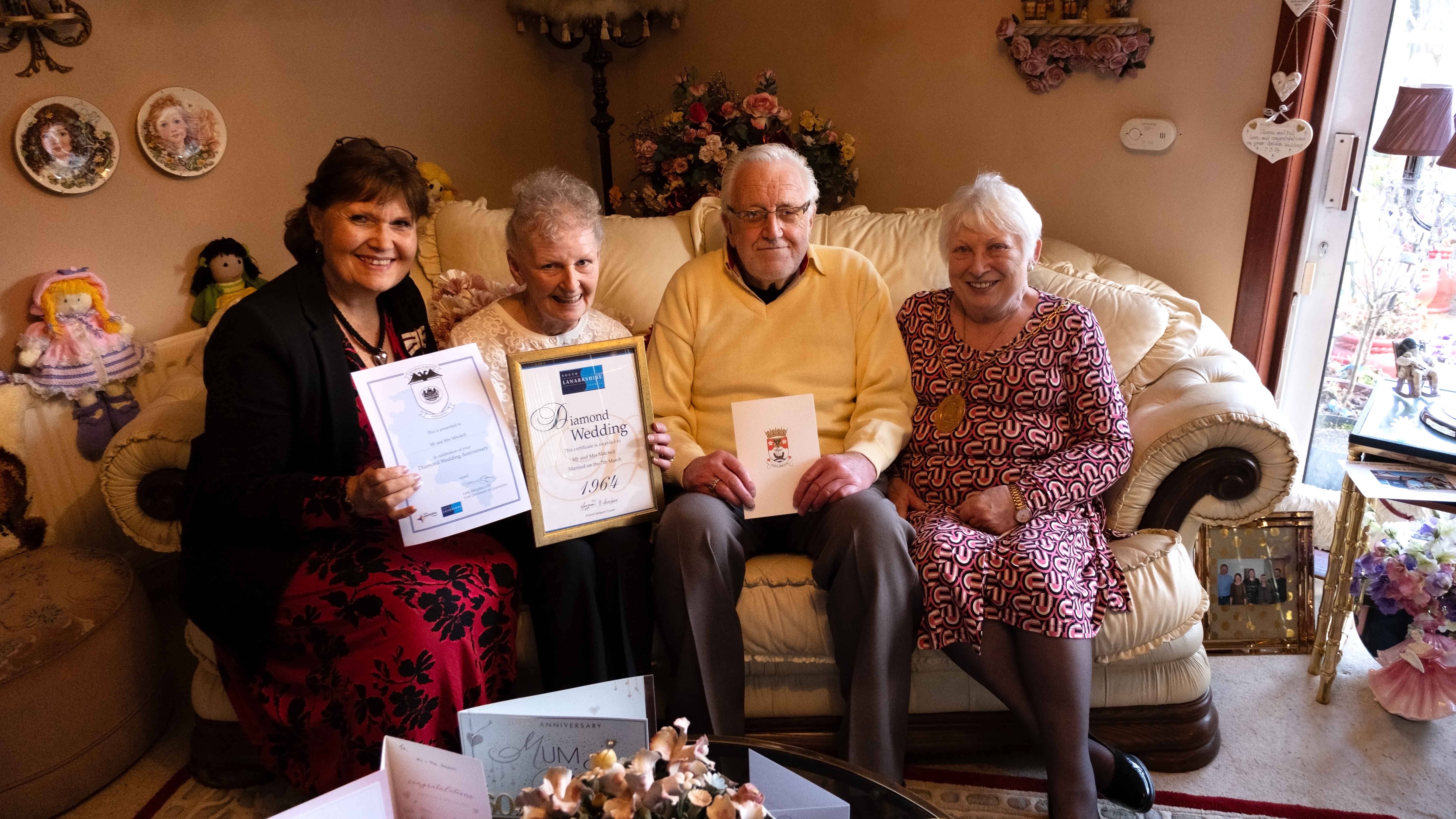 Bill and Jessie Mitchell with Provost Margaret Cooper and Deputy Lieutenant for Lanarkshire Alison Plummer