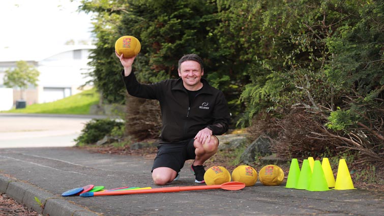 Richard Leach with sports equipment