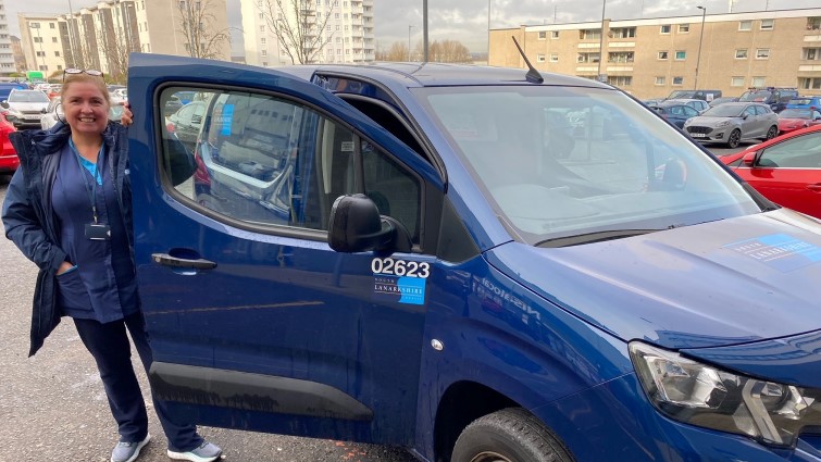 This is an image of Home Carer AnnMarie Docherty at a council vehicle