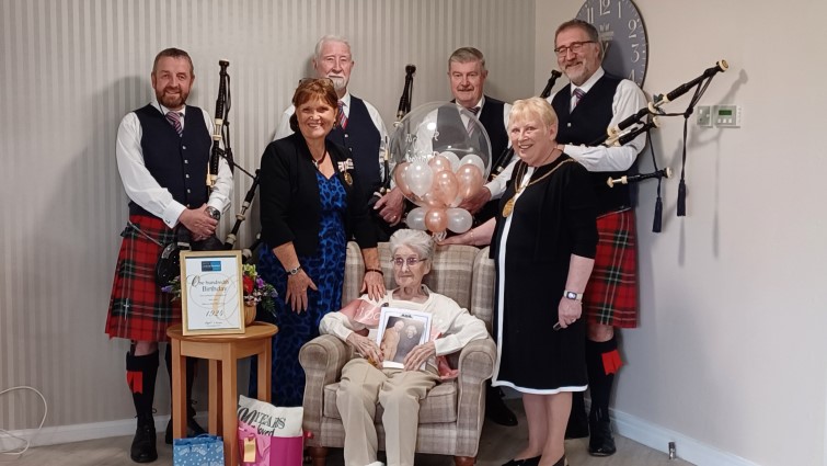 Betty Neil with East Kilbride Pipe Band, Provost Margaret Cooper and Deputy Lieutenant Alison Plummer
