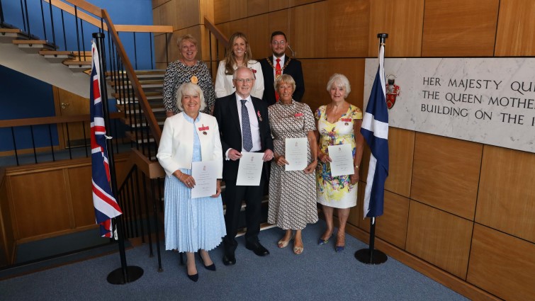 This image shows the four recipients of the British Empire Medal with Lady Haughey and Provosts Cooper and Duffy