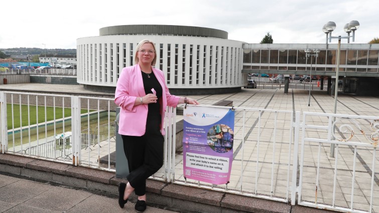 This image shows Councillor Lynsey Hamilton outside council HQ at the launch of Baby Loss Awareness Week