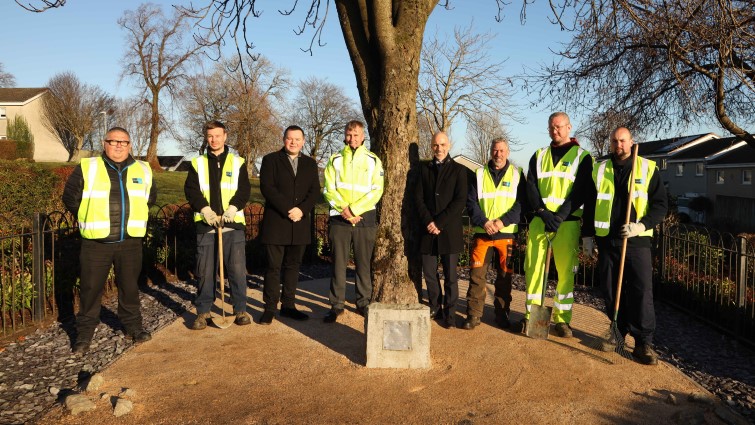 Frontline First hit squad with Council Leader Joe Fagan and Kevin Carr, the head of the council’s Facilities, Waste and Grounds Service at the Glen Dessary monument in East Kilbride
