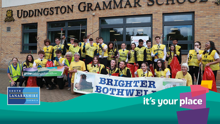 Senior pupils at Uddingston Grammar joined by Grow Uddingston, Brighter Bothwell and Community Champion from Tesco outside the school on litter picking day to help with the clean-up of the local area.