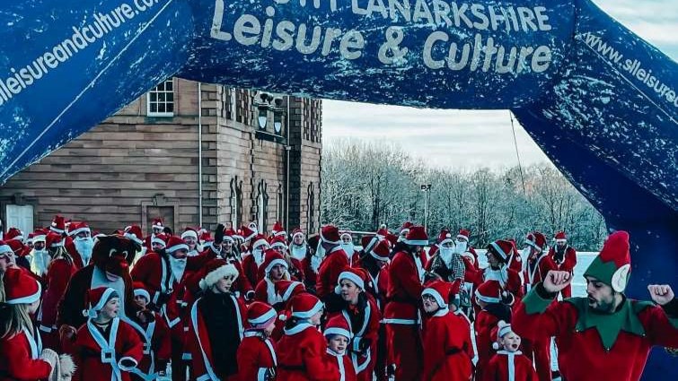 This image shows participants ahead of the Jingle All the Way 5K dash at last year's event