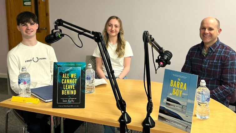 St Andrew’s and St Bride’s High School pupils, Kaden Coulter and Rachel Finnegan interviewing East Kilbride author Iain Kelly