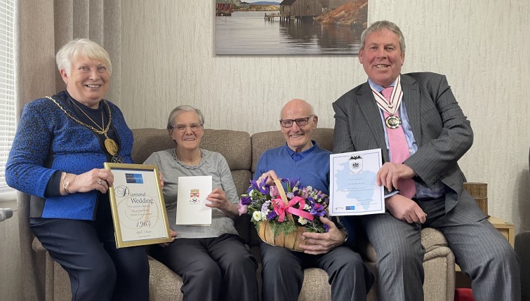 John (known as Jackie) and Agnes McNab celebrating their Diamond Wedding Anniversary with Provost Margaret Cooper and Deputy Lieutenant for Lanarkshire Dr William Morrison Young 
