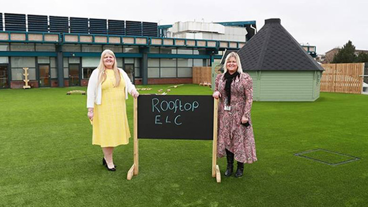 nursery staff outside an early learning centre
