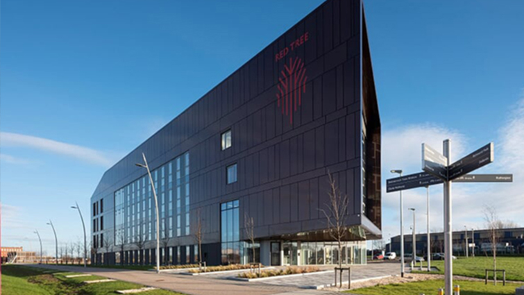This image shows the Red Tree building which is near to the soon-to-be regenerated area of Shawfield stadium