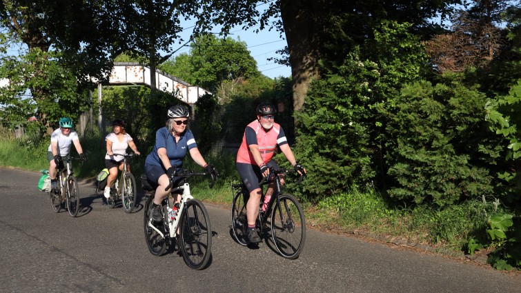 This image shows a cyclists on a road in Rutherglen