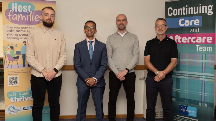 Alt text: This image shows members of the Host Families team with Professor Soumen Sengupta