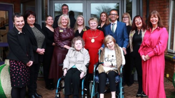 Provost Margaret Cooper and Soumen Sengupta, Director of SL HSCP, with residents, staff and guests at the 20th anniversary of Meldrum Gardens Care Home, East Kilbride.