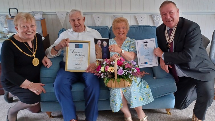 William and Alva Haig are congratulated on their Diamond Wedding Anniversary by Provost Margaret Cooper and Deputy Lieutenant David Russell.