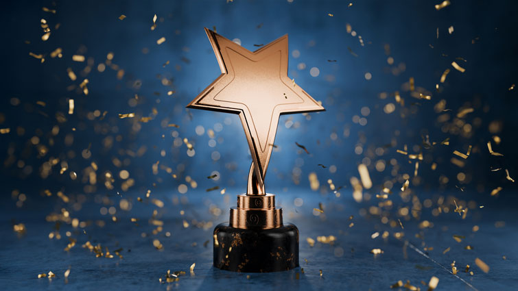 This is a graphic image with a star to reflect success for a housing team at national awards