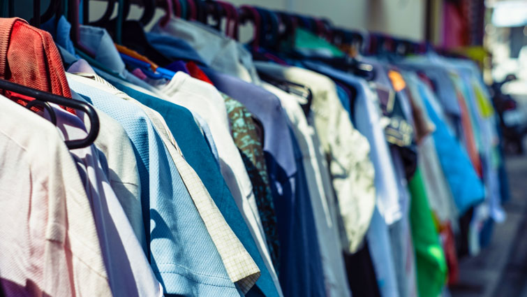 This image shows clothes on a rail