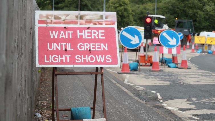 This image is of a set of temporary lights with associated signage