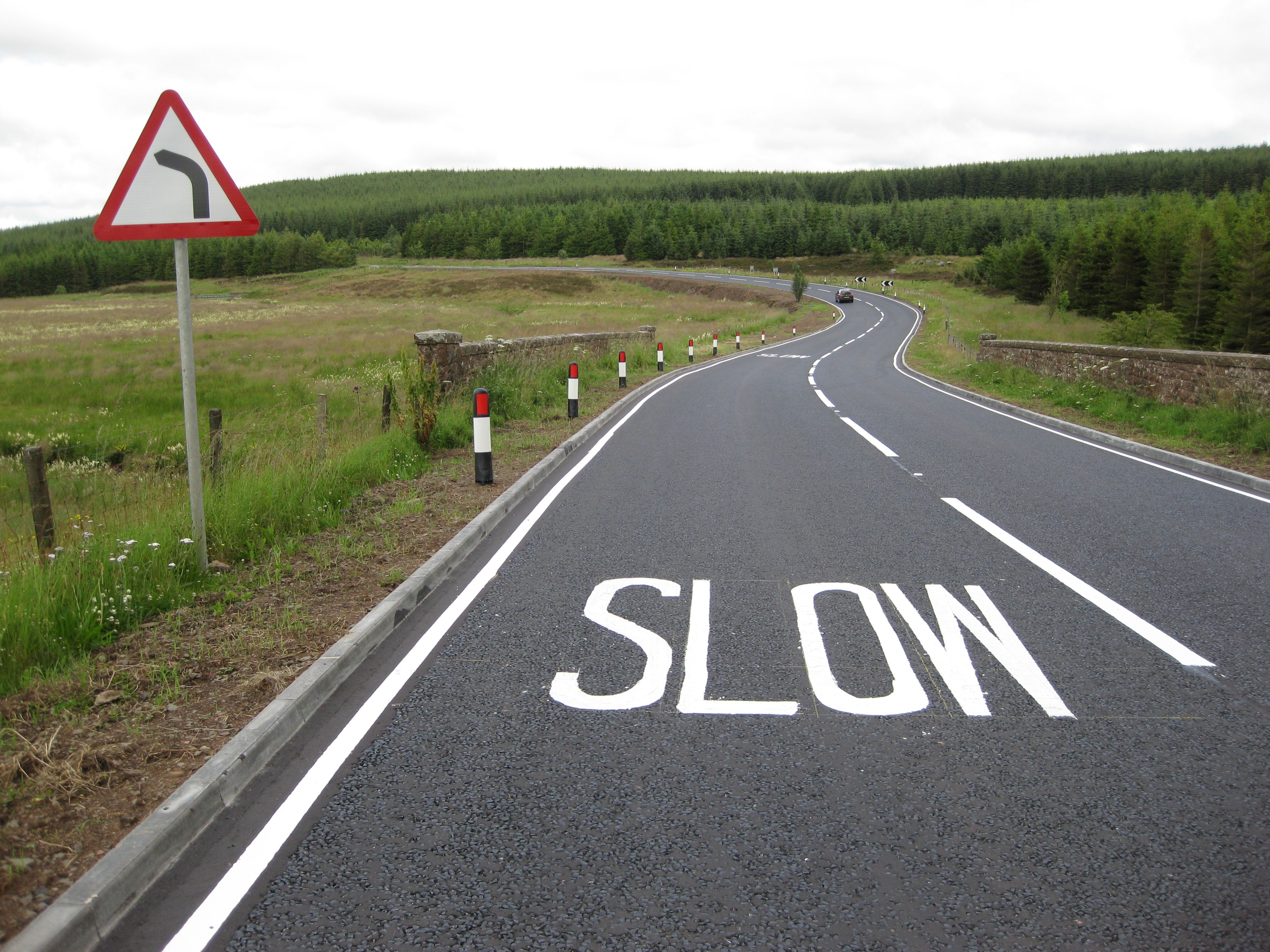 This image shows a stretch of road which has has a number of road safety features installed