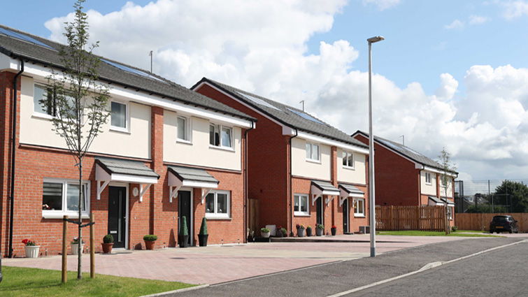 this row of new semi-detached homes with front driveway has been built on the site of the former St Blane's primary school in Blantyre. 