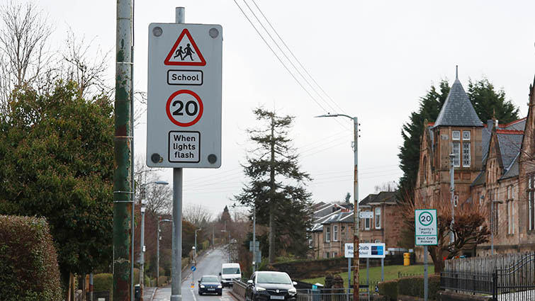 Image shows a standard 20mph sign warning drivers the speed limits apply when lights flash