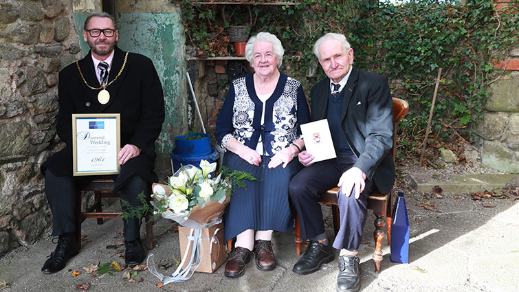 Provost Ian McAllan joining in the Diamond wedding celebrations of William and Jean Gemmell in the garden of their home in Lesmahagow