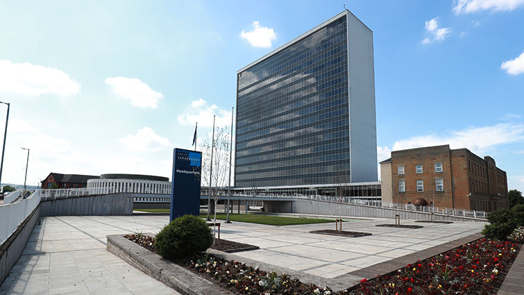 The photo shows the council's headquarters building on Almada Street, Hamilton. 