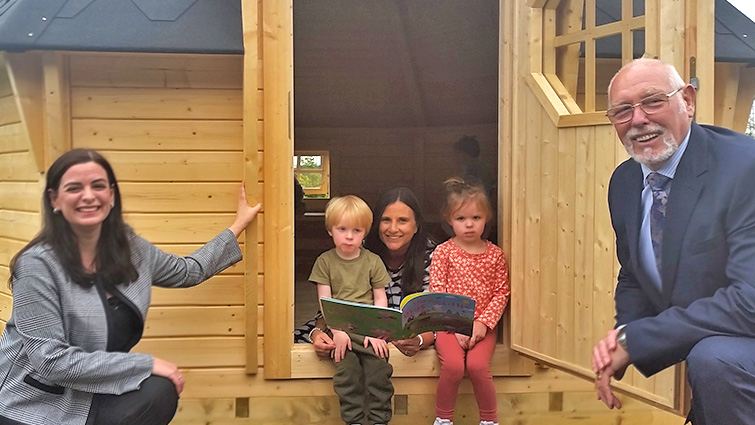 Councillr Katy Loundon and Councillor John Ross with children and staff at the Kilbryde E L C Hobbit House