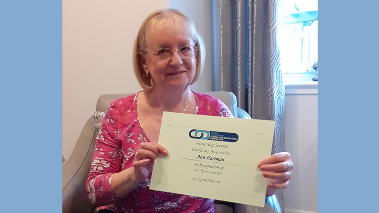 Short Breaks carer Ann Hartman with her certificate on retiral.