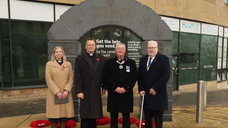 This image shows Councillor Bert Thomson, Deputy Lord Lieutenant of Lanarkshire Louis Munn, Rev Ross Blackman of Hamilton Old Parish Church and Reverend Joanne Hood of St John’s Parish Church at the VC Memorial in Hamilton