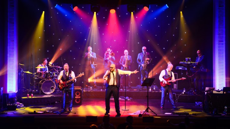 This photo shows the band on stage during a recent gig.