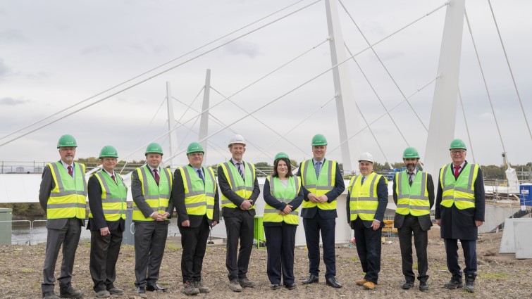 This image shows Council Leader Joe Fagan and other council leaders, along with representatives from the UK and Scottish Governments, to mark 10 years of City Deal 