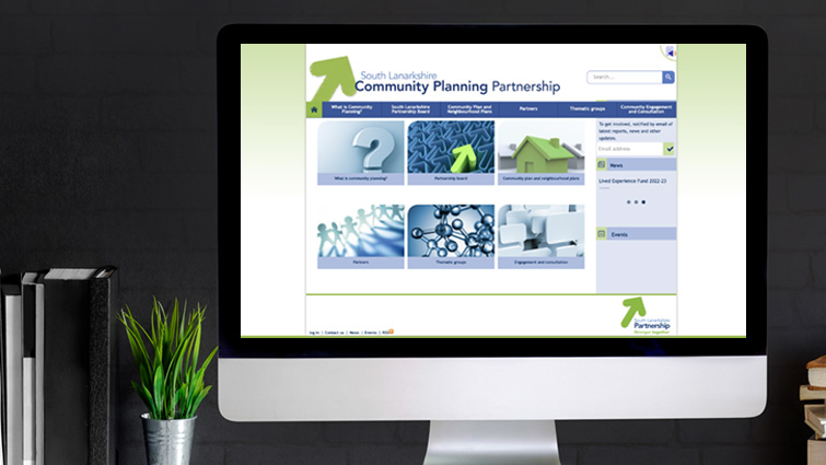 This image shows a computer displaying the home page of the Community Planning Partnership website 
