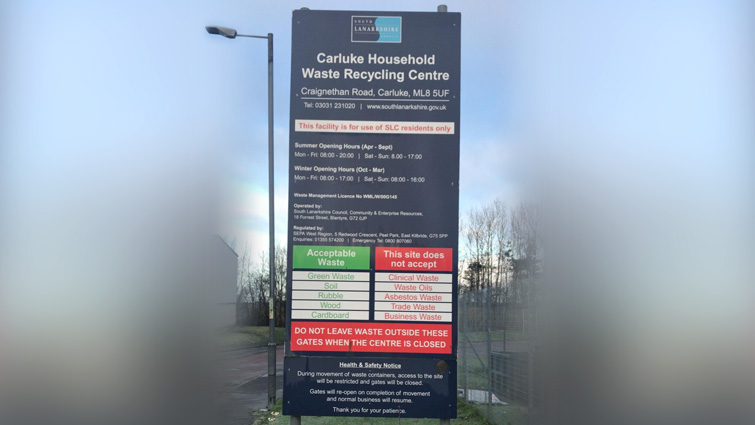 This image shows the sign at the entrance to the Carluke Household Waste and Recycling Centre 