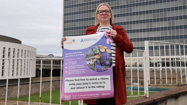 Place a ribbon in memory of babies gone too soon