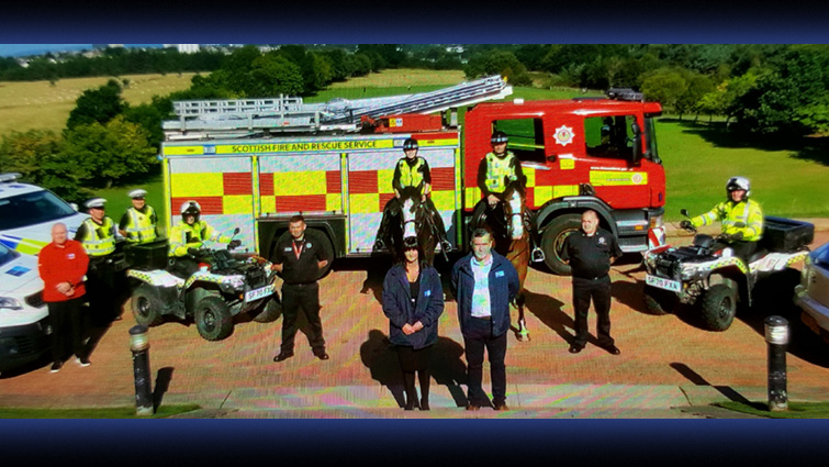 Partners gather with a fire engine to promote the Common Sense scheme