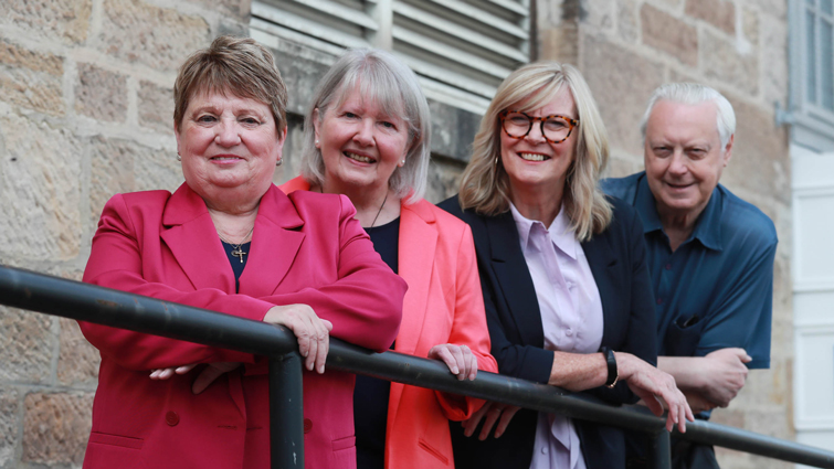 This image shows the Older People's Champion, Councillor Eileen Logan, chair and depute chair of Seniors Together and Seniors Together manager 