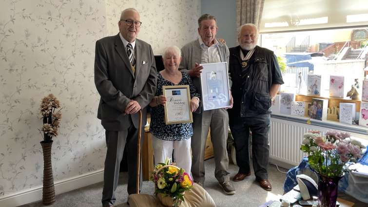 This image shows Agnes and James Walsh with South Lanarkshire’s Depute Provost Bert Thomson and Deputy Lieutenant for Lanarkshire Alexander (Sandy) Wilkie