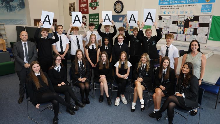 Pupils at Duncanrig Secondary School, East Kilbride, celebrate their successful Higher exam results.