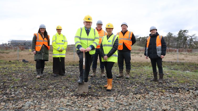 This image shows Councillor Davie McLachlan, council officials and reps from Barratt Homes West Scotland to mark the start of work for new council homes at Eaglesham View, Jackton, East Kilbride