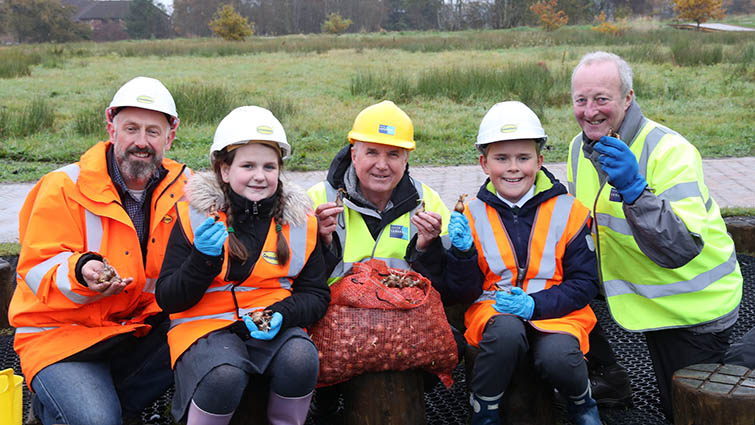 Pupils from St Leonard's Primary School are joined by Councillor John Anderson and representatives from Covanburn and Community Links at Glen Esk, East Kilbride
