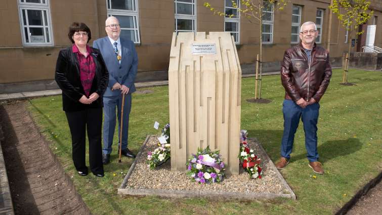 This image shows Deputy Provost Bert Thomson with trade union representatives during the annual International Workers Memorial Day service