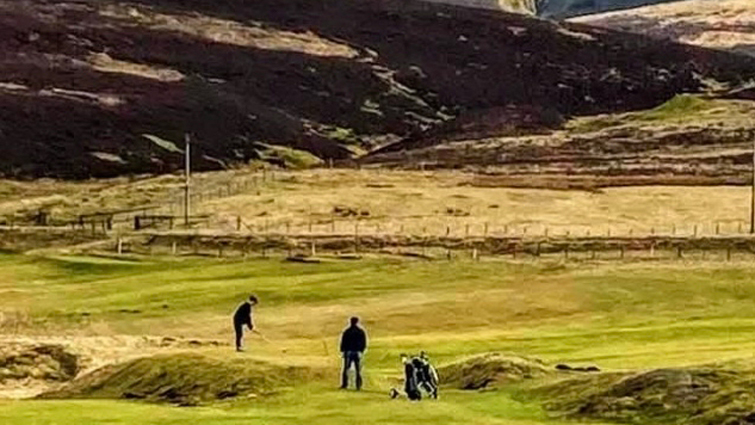 This image shows two golfers playing Leadhills Golf Course which was recently awarded money by the Renewable Energy Fund