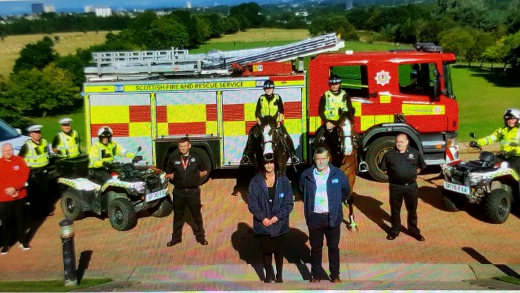 council and emergency services staff with a range of vehicles 