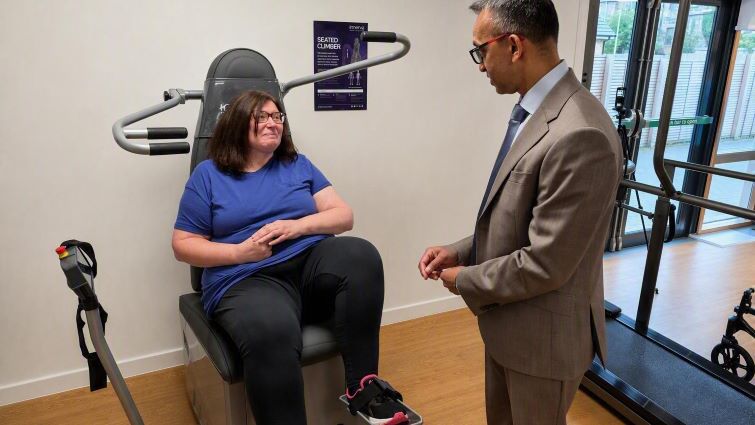 This image shows Professor Soumen Sengupta with Fiona Wilkie, who is taking part in an innovative rehabilitation programme at Blantyre LIFE
