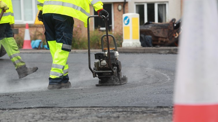 This image shows a road being resurfaced in South Lanakrshire