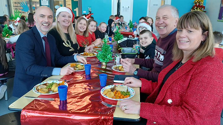 Festive cheer as pupils tuck into Christmas lunch