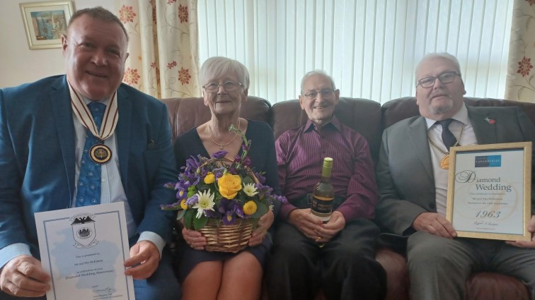 (l-r) Lord Lieutenant for Lanarkshire David Russell, Margaret and Alexander McKinnon and Depute Provost Bert Thomson 