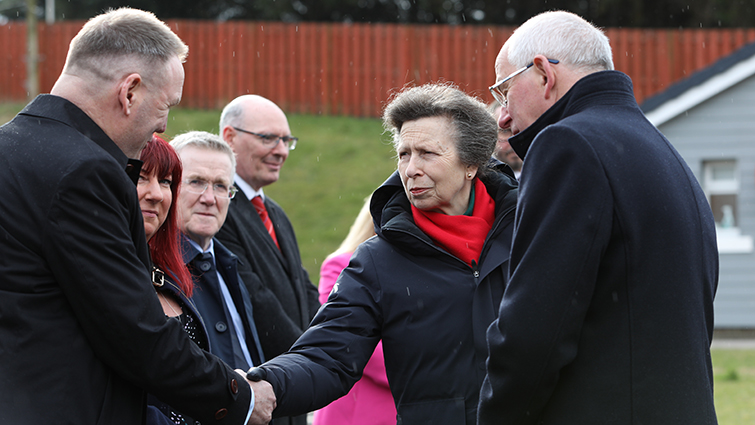 This image shows HRH Princess Anne at a site visit to a gypsy/traveller site in South Lanarkshire