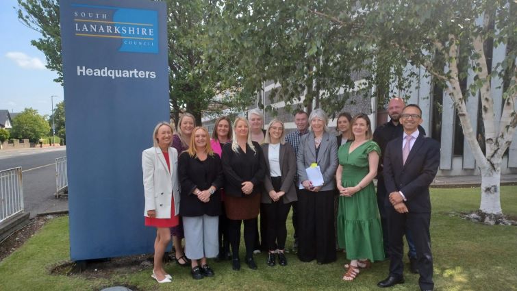 This image shows staff from Recovery Orientated Justice Service and elected members outside council HQ in Hamilton