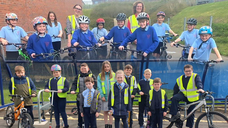 This images shows pupils from Wester Overton Primary and St John's (Blackwood) Primary schools following their success in the Big Walk and Wheel Challenge