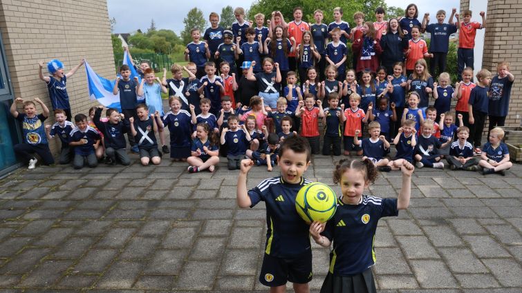Pupils at Canberra PS, East Kilbride, show support for the Scotland men's football team as they prepare to play their first match at the 2026 World Cup finals.